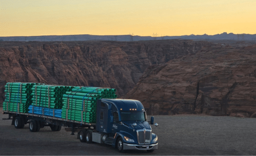 Melton truck with a load of pipes